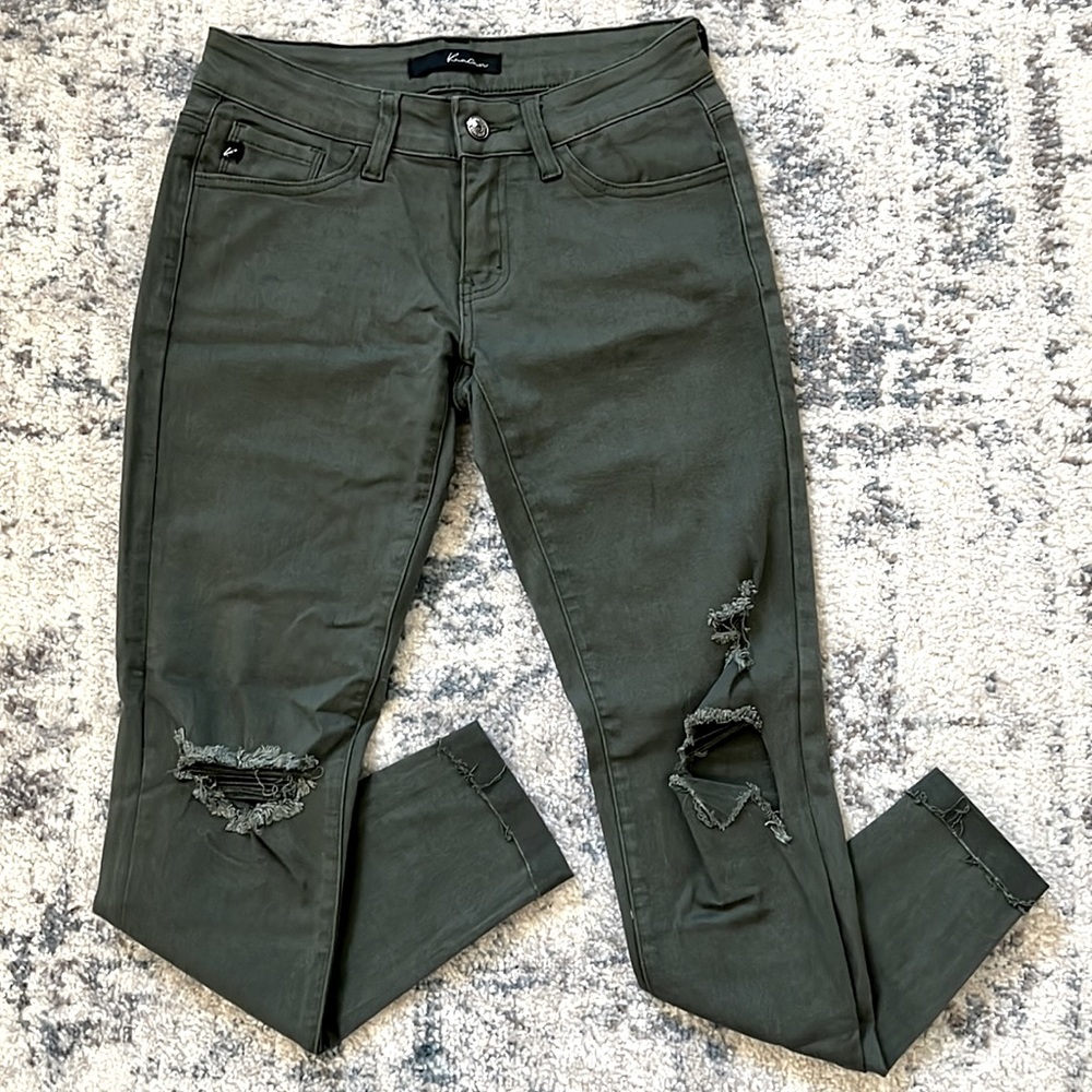 Olive green distressed KanCan skinny jeans in size 3/25.